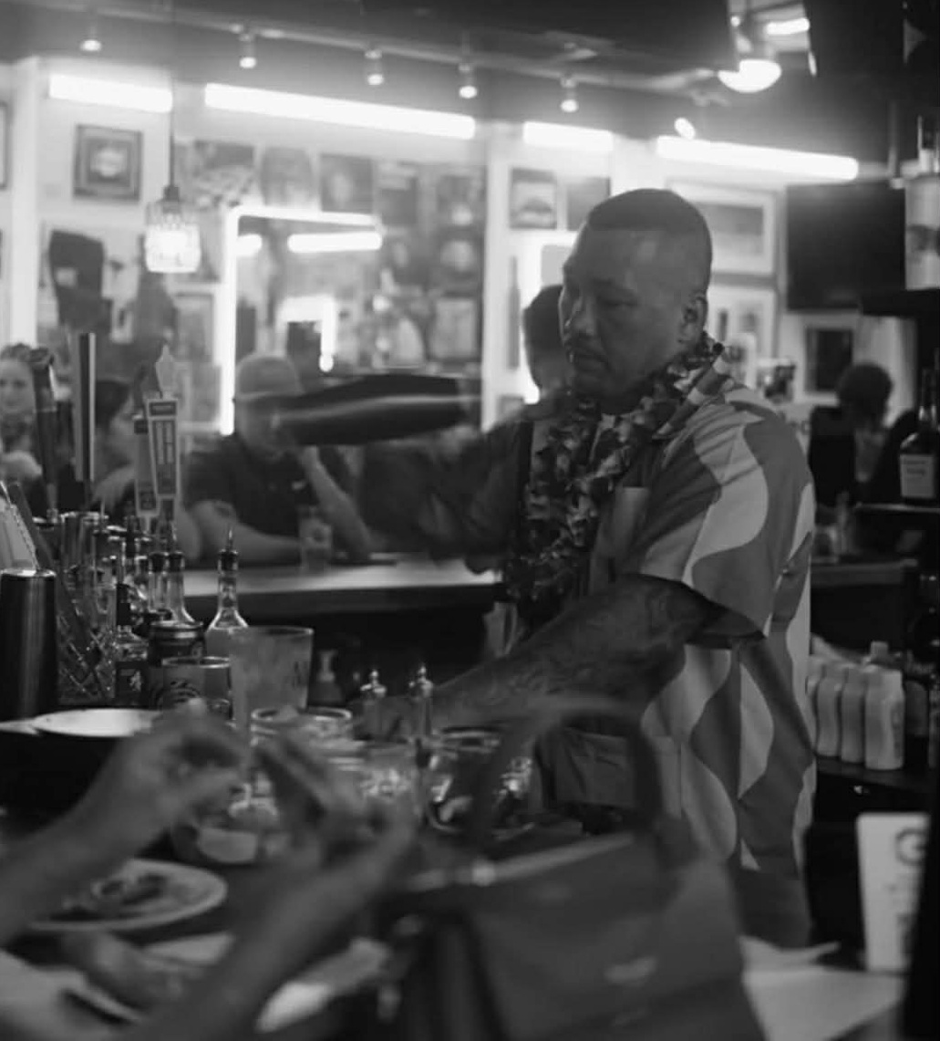 Bartender preparing a craft cocktail at Vintage in Downtown Honolulu